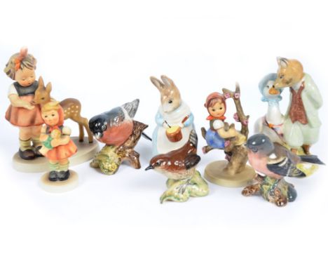 A quantity of ceramic models, including Beswick and Royal Albert Beatrix Potter, Beswick birds, Goebel Hummel figure groups, 