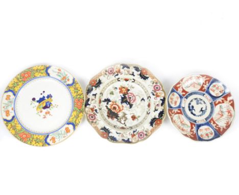 A collection of miscellaneous porcelain plates and dishes, including a Meiji period Imari plate, a Minton 'Chinese Blossom' p