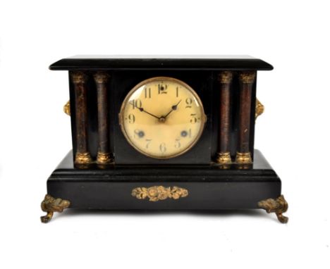 A 19th Century American wooden cased mantle clock, enamel dial with Arabic numerals, 28 cm high