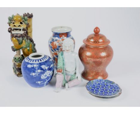 A collection of Asian ceramics, comprising an Imari vase, floral and grotesque decoration, 15 cm high; a baluster ginger jar 