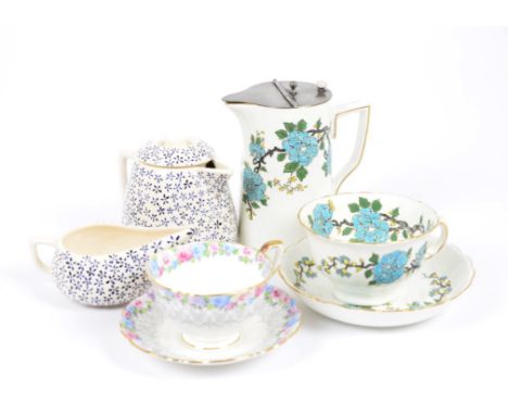 Two 20th Century tea services, including a Royal Staffordshire service, consisting of cups, saucers, milk jug, sugar bowl and