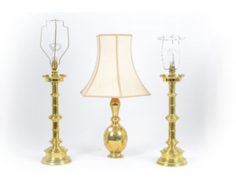 A pair of brass table lamps, converted from candlesticks, knopped column, stepped base; together with a brass table lamp, ara