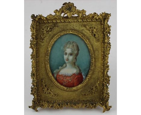 A gilt framed portrait miniature of a lady, oval, frame 15cm height