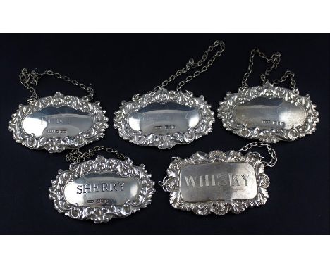 **REOFFER ETWALL JAN £40/£60**A matched set of four silver decanter labels, three by Richards and knight, assayed London 1966