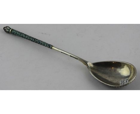 **REOFFER ETWALL JAN £60/£80**A late 19th century Russian silver and enamel spoon, having the bowl back, upper stem and termi