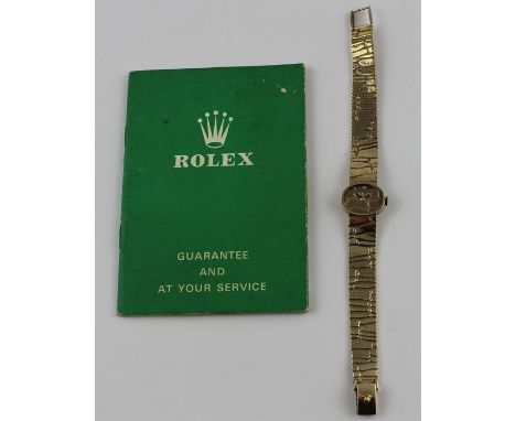 A 9ct. gold ladies' Rolex Precision bracelet watch,&nbsp;c.1967, manual movement, Cal. 1401, having oval gold textured dial w
