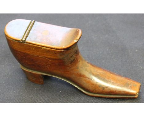 A late 19th century novelty treen snuff box, in the form of a boot, 12cm long x 6cm high.