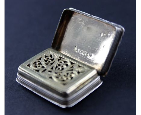 A George IV silver vinaigrette, by Nathaniel Mills, assayed Birmingham 1828, of typical rectangular form, the engine turned t