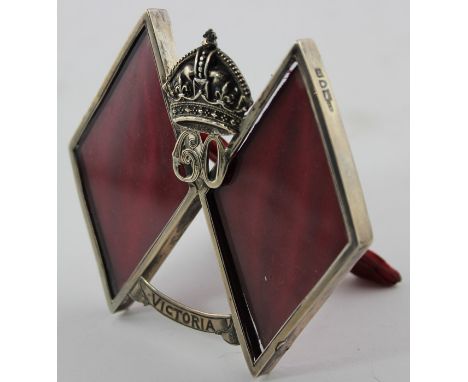 A Victorian Diamond Jubilee silver double photograph frame, by George Heath, assayed London 1897, fashioned as a pair of join