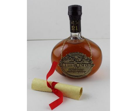 Two Whyte &amp; Mackay 21 year old Scotch Whisky decanter bottles, both in presentation boxes with scrolls. (2)