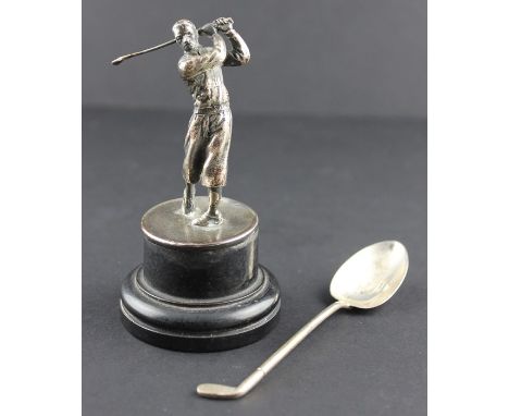 A silver golf trophy, by Edward Barnard &amp; Sons Ltd, assayed London 1936, modelled as a golfer wearing plus fours playing 