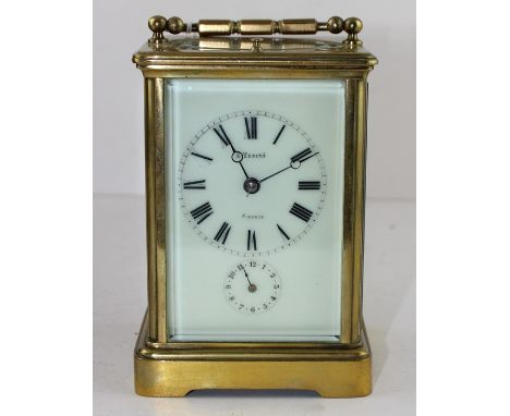 A French lacquered brass Grande Sonnerie carriage clock, the full length enamel dial with Roman numerals and subsidiary secon