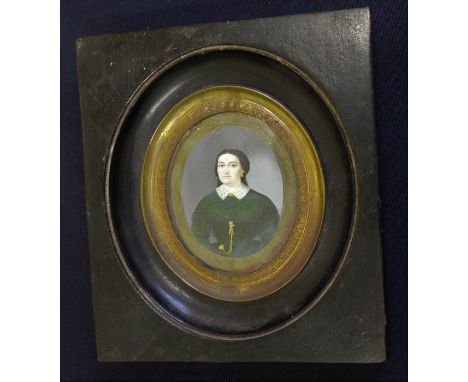 **REOFFER ETWALL JAN £20/£30**19th century Italian School, Portrait miniature of a woman wearing a green dress, on card, insc