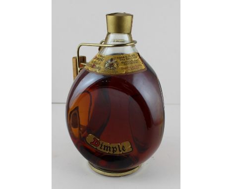 A Dimple Haig Scotch Whisky US Half Gallon, boxed.