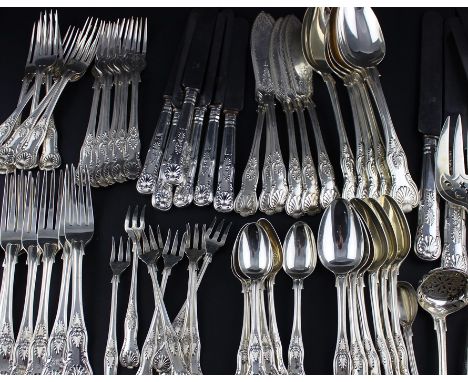 An extensive matched set of silver Kings pattern flatware for six, to include; six large William IV silver table forks, all a