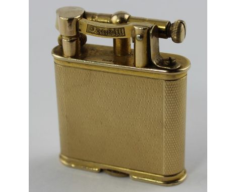 A 9ct. yellow gold Alfred Dunhill &amp; Sons lift arm table cigarette lighter, of rectangular form with curved ends and engin