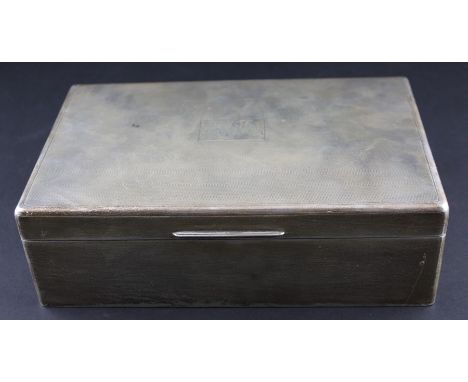A rectangular silver cigar box, by Aldie Brothers Ltd, assayed Birmingham 1937. having engine turned decoration to lid with v