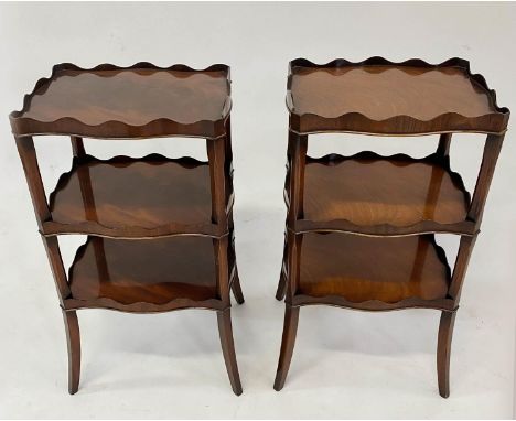 LAMP TABLES, a pair, George III mahogany of etagere  form each with three galleried serpentine tiers, 36cm x 27cm D x 66cm H.