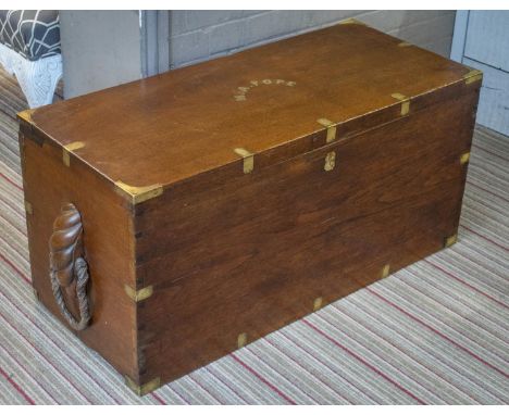 TRUNK, 46cm H x 96cm W x 42cm D, late 19th century teak and brass bound with rope handles, named M. A. Pope. 