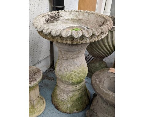 ARCHITECTURAL GARDEN PLANTERS ON STANDS, a pair, composite stone, 79cm x 53cm diam. (2) 