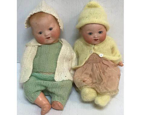 Two Armand Marseille baby dolls of small porportions, the backs of the heads inscribed "AM Germany 351.12K" and "AM Germany 3
