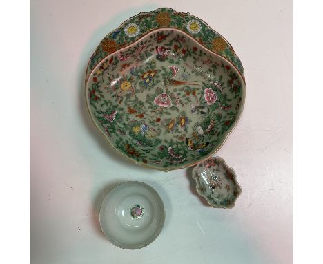 A 19th Century Chinese famille rose leaf shaped serving dish with half rim and all-over floral and bird and butterfly decorat