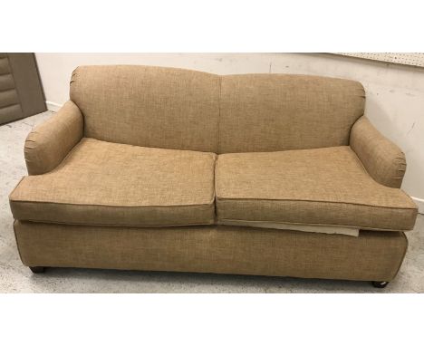 A modern fawn upholstered two seat sofa bed, 173 cm wide x 94 cm deep x 80 cm high CONDITION REPORTS Mattress is a bit grubby