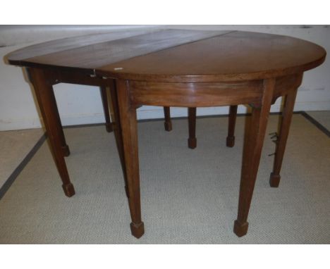 A 19th Century mahogany D end dining table of plain form, raised on square tapered legs to block feet (one extra leaf), 162 c