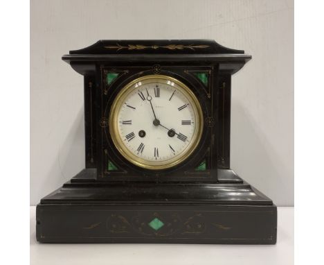 A late Victorian black marble and malachite inlaid mantel clock, the eight day movement with circular enameled dial and Roman