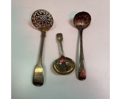 A Victorian silver caddy spoon (by Charles Lias, London 1839), together with a Victorian silver ladle with scallop bowl and a