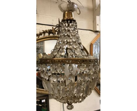 A 20th Century brass six light electrolier in the 19th Century style with cut glass drops, 47 cm diameter x approx 50 cm drop