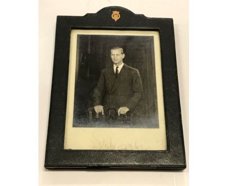 A framed and glazed black and white photographic portrait study of "Prince Philip", signed "Philip 1962", easel frame with st