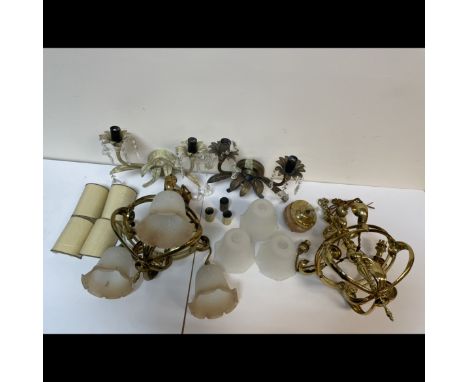 A pair of Art Nouveau style brass ceiling lights and two lotus leaf decorated twin branch wall sconces with cut glass drops  