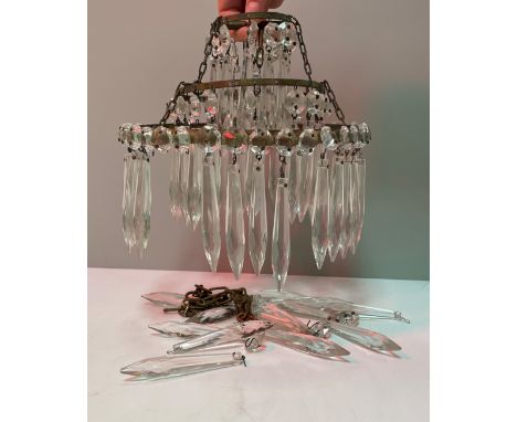 A three tier cut glass drop ceiling light, 20 cm diameter x approx 23 cm drop