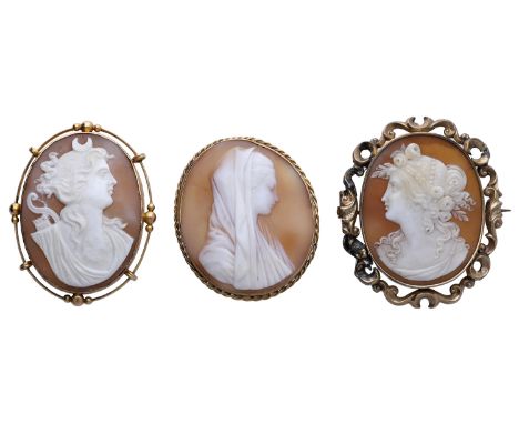 Three late 19th/early 20th century shell cameo brooches, the first carved to depict Diana the Huntress, the second, depicting