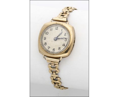 Rolex. A lady’s gold cushion-form wristwatch, circa 1929 Movement: manual winding, 15 jewels Dial: silvered, engine-turned, A