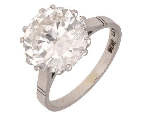 A solitaire diamond ring, the brilliant-cut diamond weighing 4.28 carats within twin claw setting, platinum mounted, the shan