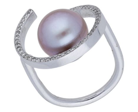 A cultured pearl and diamond ring by Lily Hastedt, 2009, the pink cultured pearl mounted within an open sphere of brilliant-c