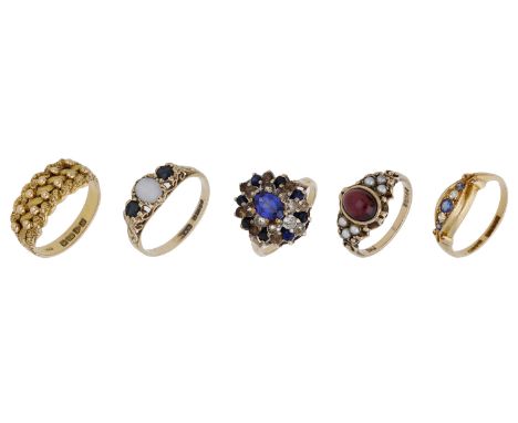 A collection of five rings, comprising an 18ct gold woven ring, an 18ct gold  sapphire and diamond three stone ring, two 9ct 