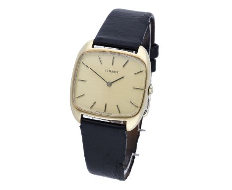 Tissot. A gold cushion-form wristwatch, circa 1970. Movement: manual winding, no. 18884051. Dial: gilt, applied baton indexes