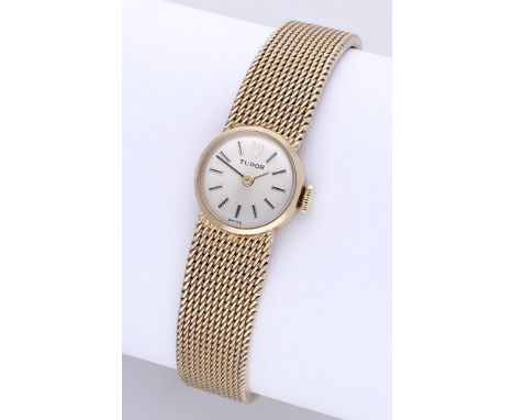 Tudor. A lady’s gold bracelet watch, Ref. 7076, circa 1973. Movement: cal. 2411, manual winding, 17 jewels. Dial: silvered, a