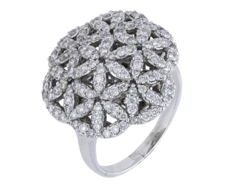 A diamond set dress ring, composed of pierced brilliant-cut diamond flower head clusters, stamped ‘18K’ and ‘750’, total diam