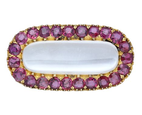 A ruby and moonstone brooch, the shaped rectangular moonstone cabochon set within a surround of circular-cut rubies, gold mou