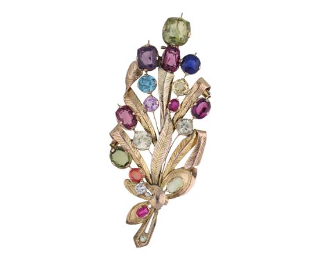 A mid 20th century gem-set spray brooch, the engraved foliage scattered with various gemstones to include sapphire, ruby, blu