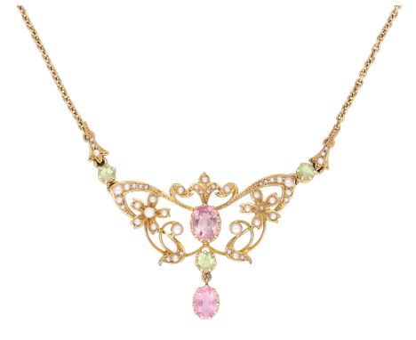 A gem-set necklace, circa 1900, the cable-link chain leading to a scrolling frontispiece with flowerhead detailing, set throu