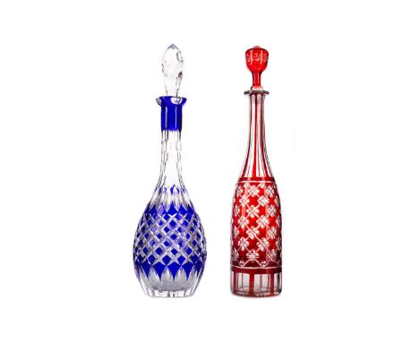 LATE 19TH CENTURY BOHEMIAN RUBY FLASHED DECANTER,with hollow stopper, of mallet form with facet cut neck over a diamond and q