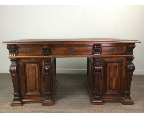 VICTORAN MAHOGANY PEDESTAL DESK,the rectangular top with moulded edge, inset tan writing surface, with three frieze drawers o
