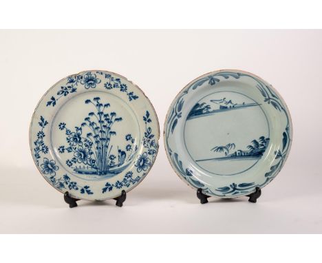 AN EIGHTEENTH CENTURY BRISTOL DELFT PLATE, painted with simple chinoiserie landscape and stylised border, 8 3/4" (22cm) diame