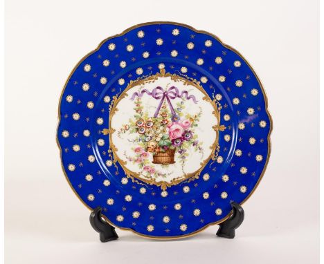LATE NINETEENTH/ EARLY TWENTIETH CENTURY SEVRES HAND PAINTED CABINET PLATE, the gilt lined centre painted with a ribbon tied 