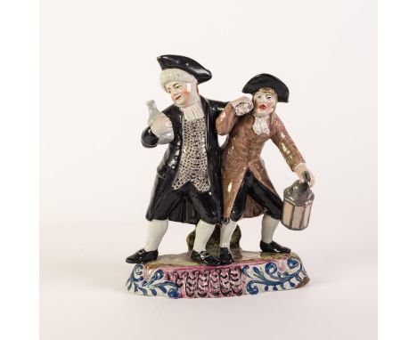 NINETEENTH CENTURY STAFFORDSHIRE THE PARSON AND HIS CLERK POTTERY GROUP, painted in colours and raised on a moulded, rounded 